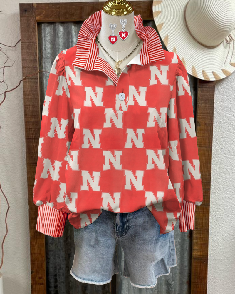 Nebraska Ruffle Stripe Trim Top